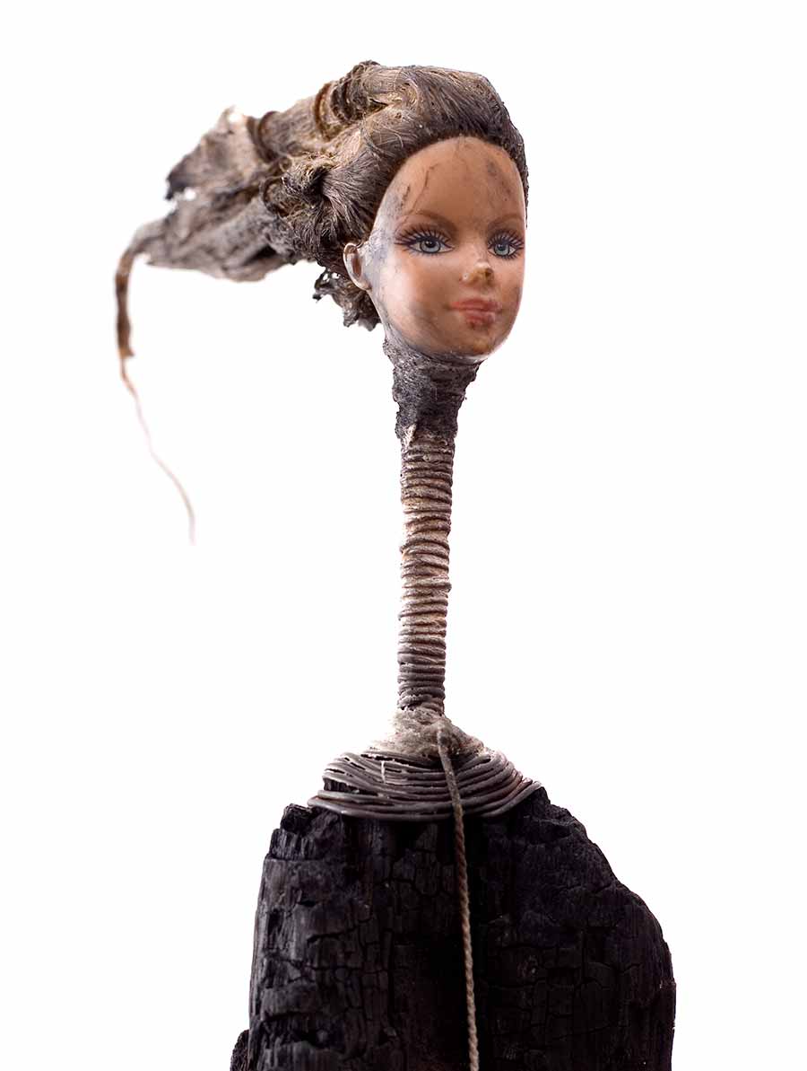 <strong>G&eacute;rard Quenum</strong>, <em>Barbie en Afrique (Barbie in Africa)</em>, 2004. Wood, doll, wire and metal, 169 x 22 cm.<br>Private Collection.