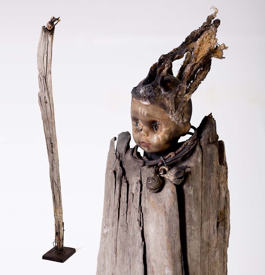 Gérard Quenum, Modéliste (The Model), 2008. Wood, metal and plastic doll, 228 x 30 x 30 cm. 