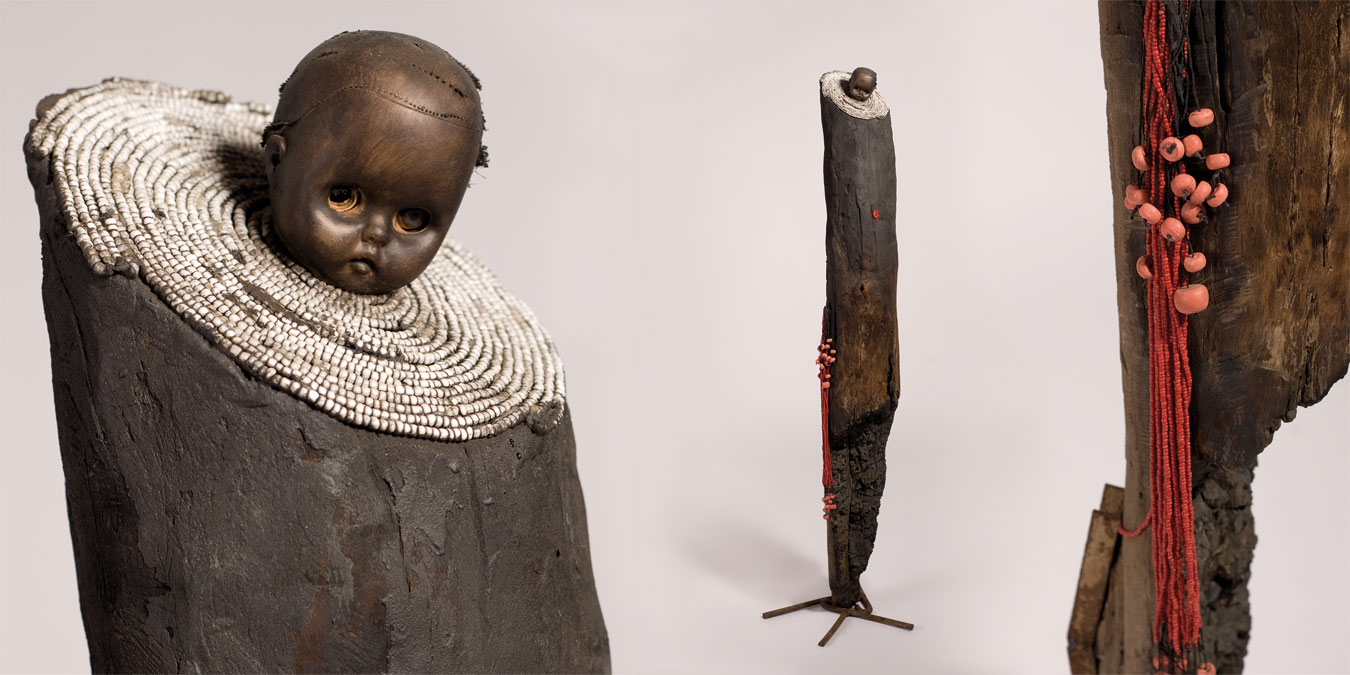 Gérard Quenum, La bonne bergère (The Good Shepherdess), 2012. Wood, metal, beads, rope and plastic doll, 168 x 43 x 43 cm.