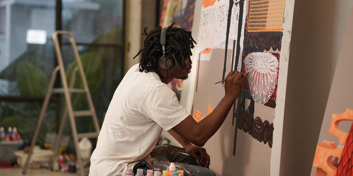 Eddy Kamuanga Ilung working in his studio in Kinshasa, 2021. Photo: Ray Kamena.