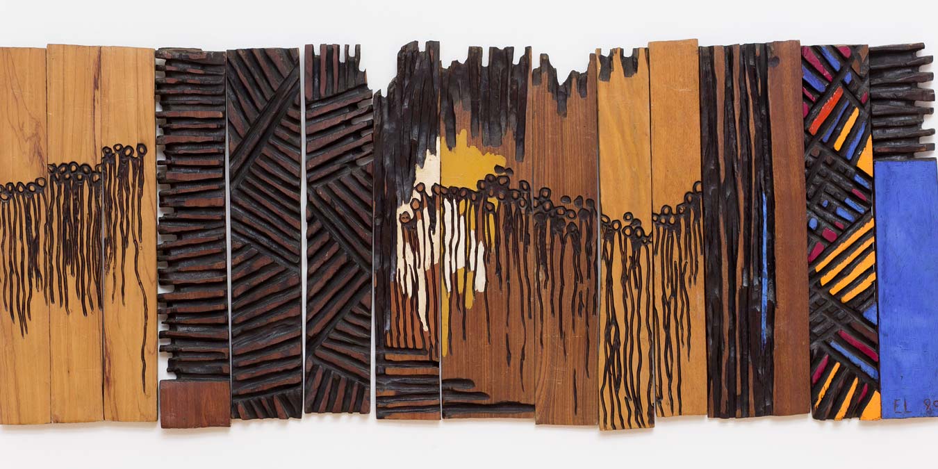 El Anatsui, Solemn Crowd at Dawn (detail), 1989. Tropical hardwoods, tempera and house paint, 65 x 140 cm.