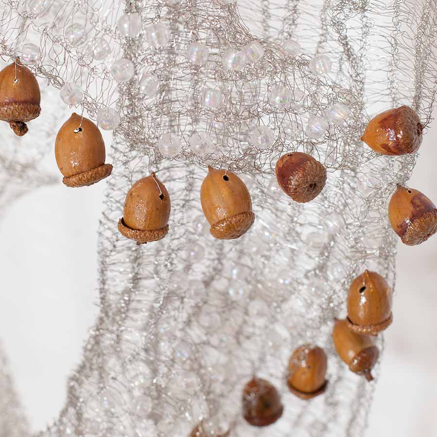 Naomi Wanjiku Gakunga, Encino (detail), 2010. Stainless steel wire and acorns, 181 x 87 cm.
